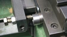 Lathe saddle stop, setting