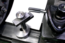 Screw cutting on the lathe. useing a tap as an internal chaser.