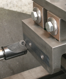 Milling on the lathe using a vertical slide.